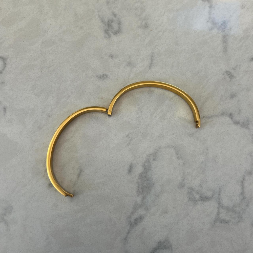 gold plated bangle with white diamonds gems